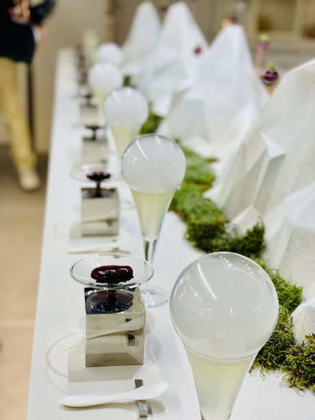 Dishes lined up ready to be served at Pago de Carraovejas