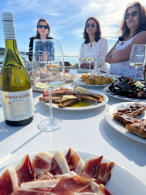 Tapas and Codax wine next to the bay