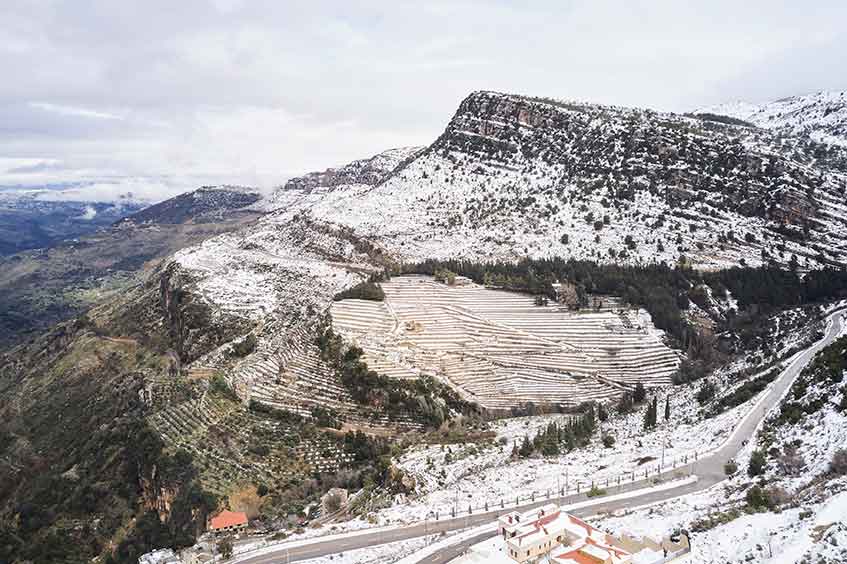 Snow lying on Ixsir's vertigious vineyards in winter