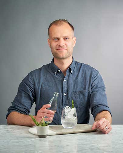 Olivier Ward mixing a cocktail