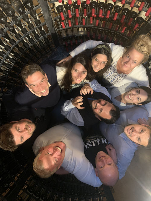 Group photo from above in the winery cellars