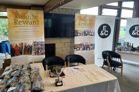 Room to Reward golf day with E&C banner