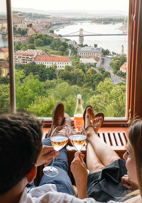 Enjoying a glass of Sauska rosé whilst enjoying a view of the Danube flowing through Budapest