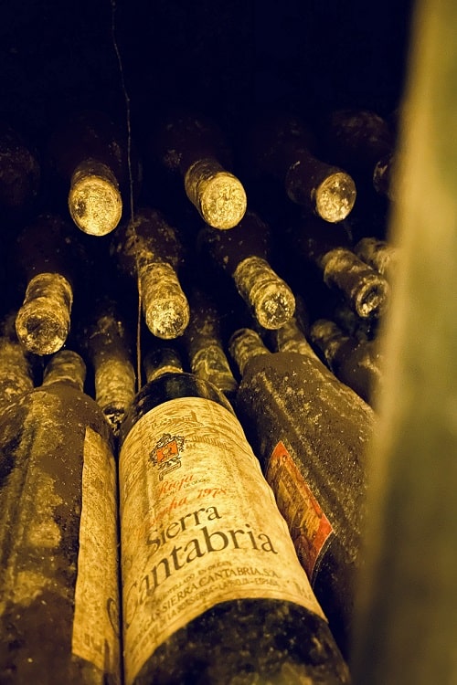 Ancient bottles ageing in Sierra Cantabria's cellar